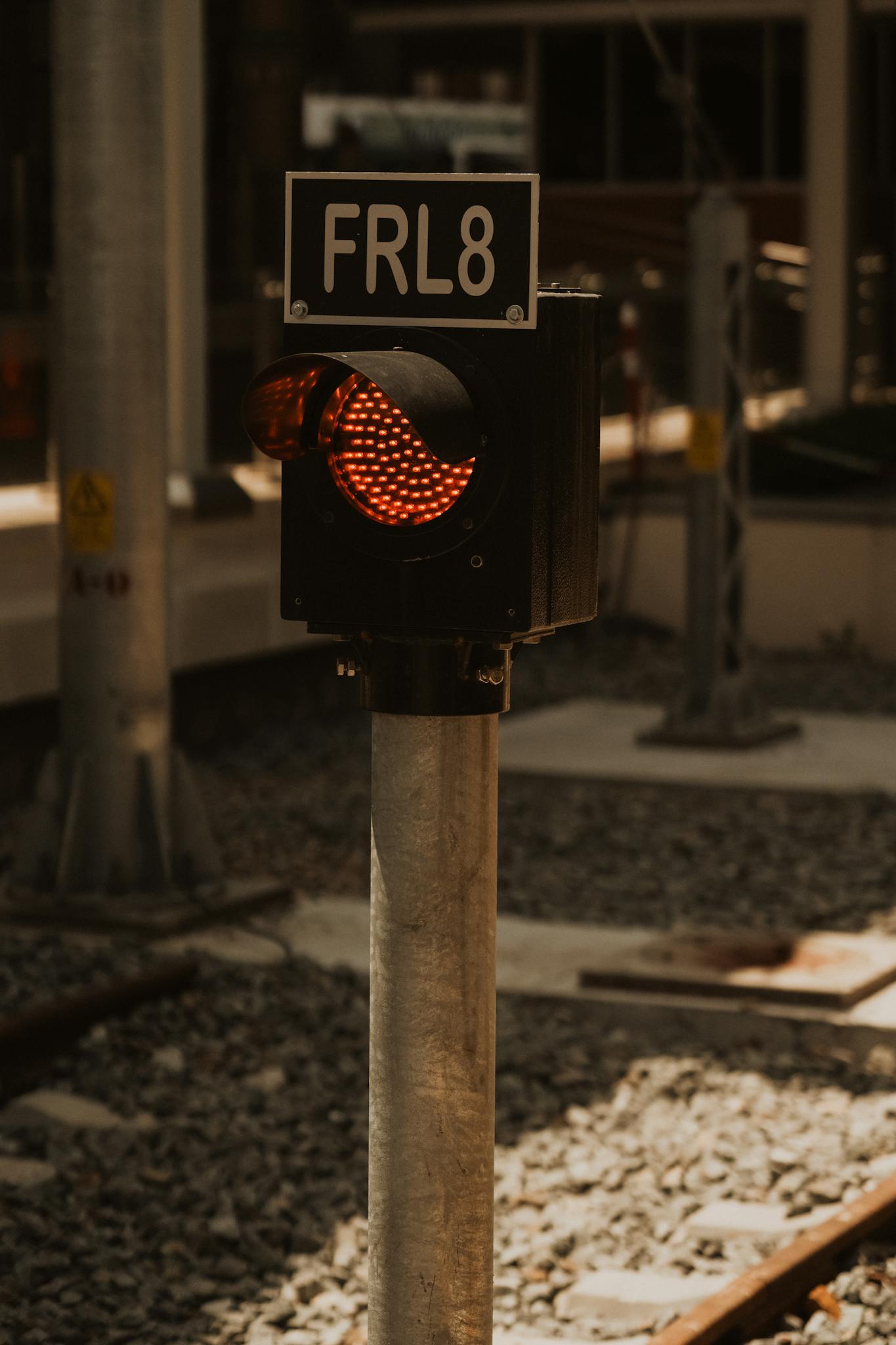 Close-up of a red railway signal at an Istanbul station, Türkiye.